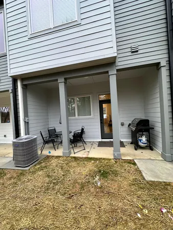 a view of house with patio outdoor seating space
