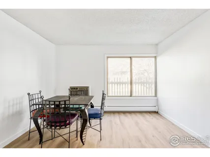 a workspace with furniture and wooden floor