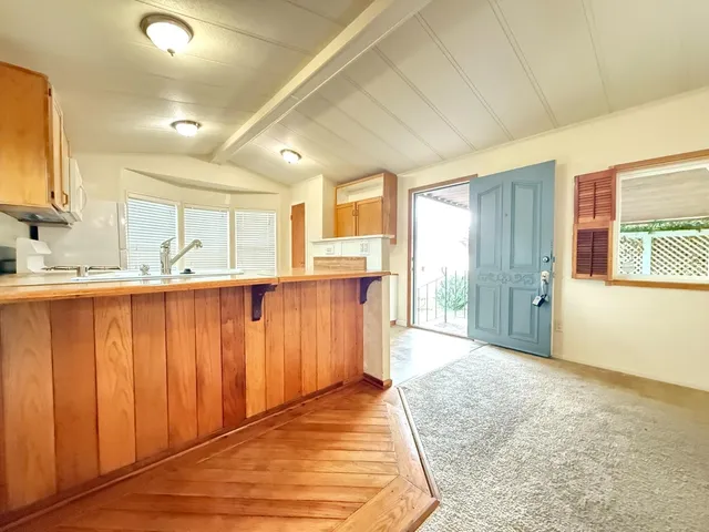 a bathroom with a tub and a sink