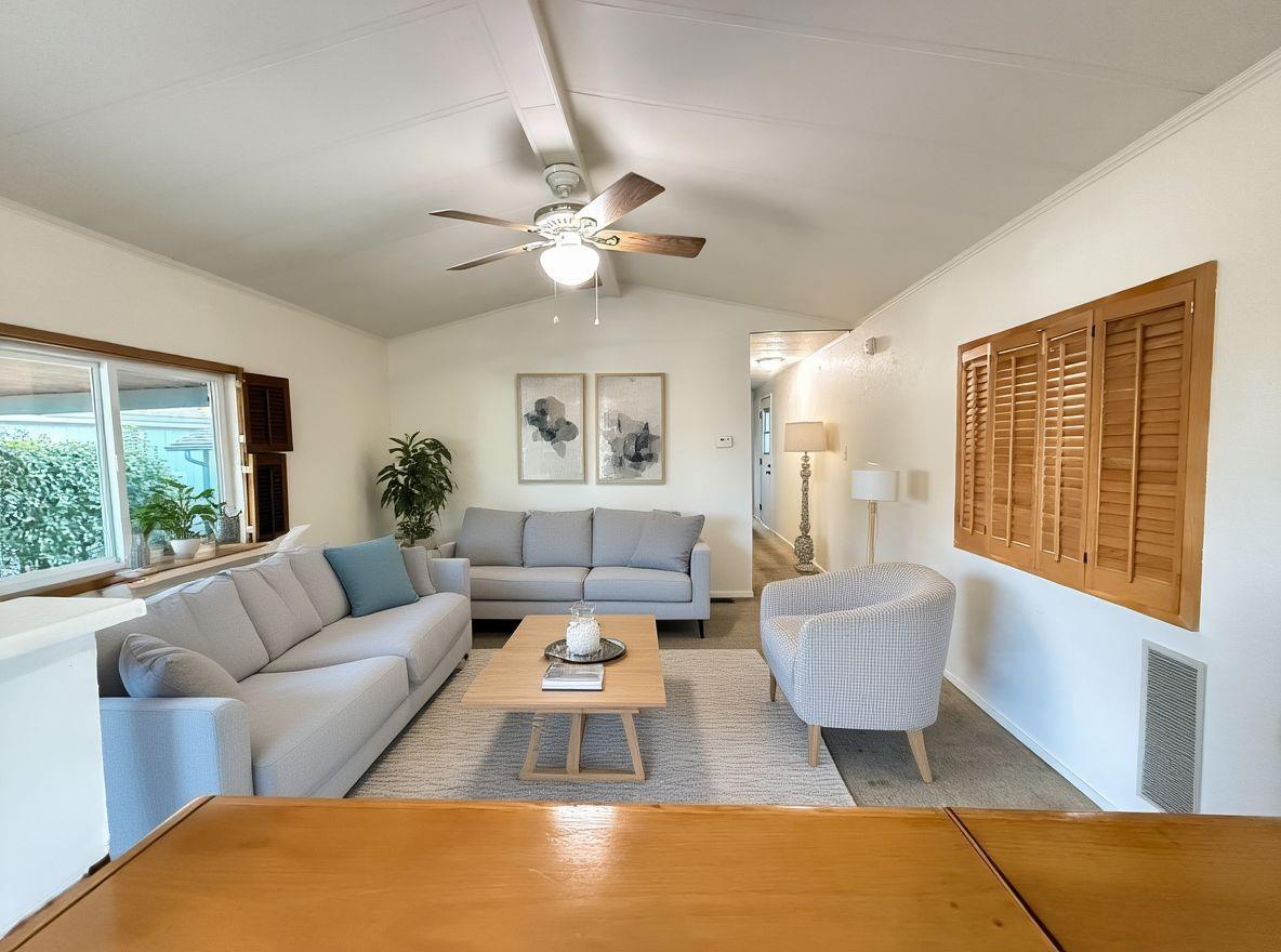 1556 Crown Road, Unit 1556 Petaluma, CA 94954 - Photo 18 of 21 a living room with furniture and a large window