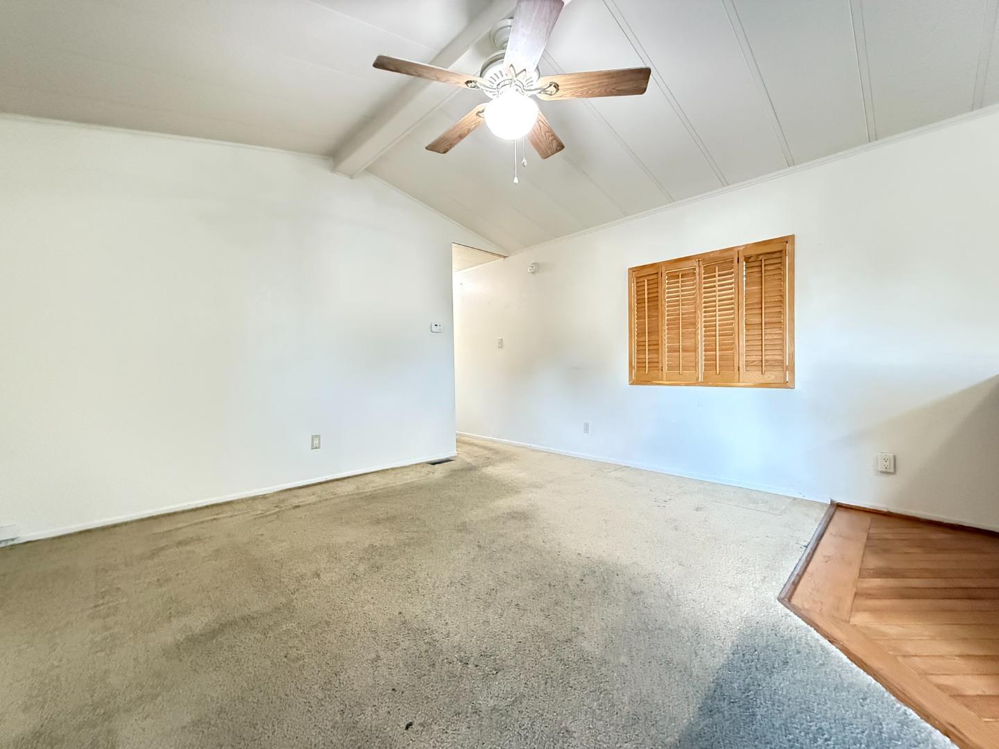 1556 Crown Road, Unit 1556 Petaluma, CA 94954 - Photo 5 of 21 an empty room with a window and a ceiling fan