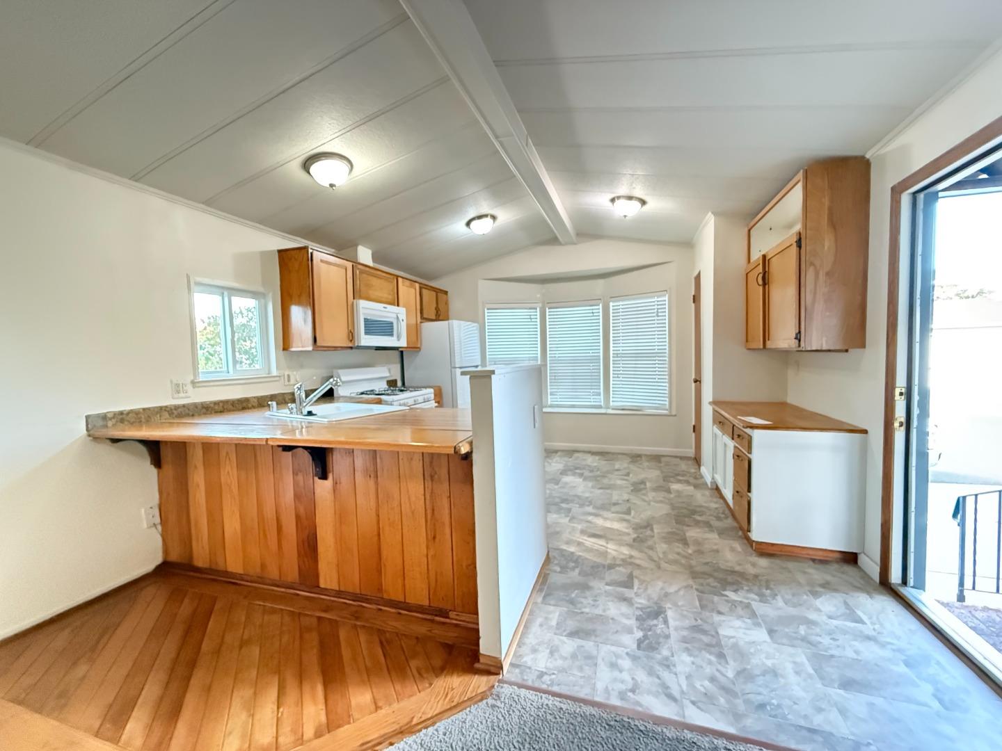 1556 Crown Road, Unit 1556 Petaluma, CA 94954 - Photo 7 of 21 a view of kitchen with wooden floor