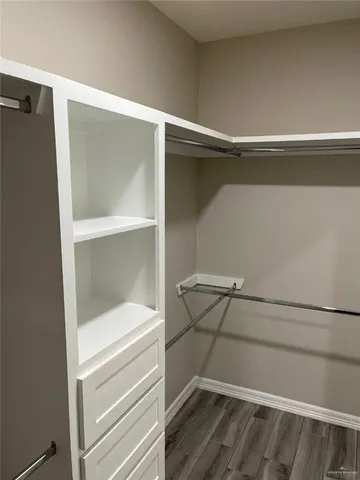 a empty closet with white paint