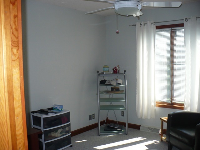 18430 East Twombly Road Rochelle, IL 61068 - Photo 14 of 25 a room with window and furniture