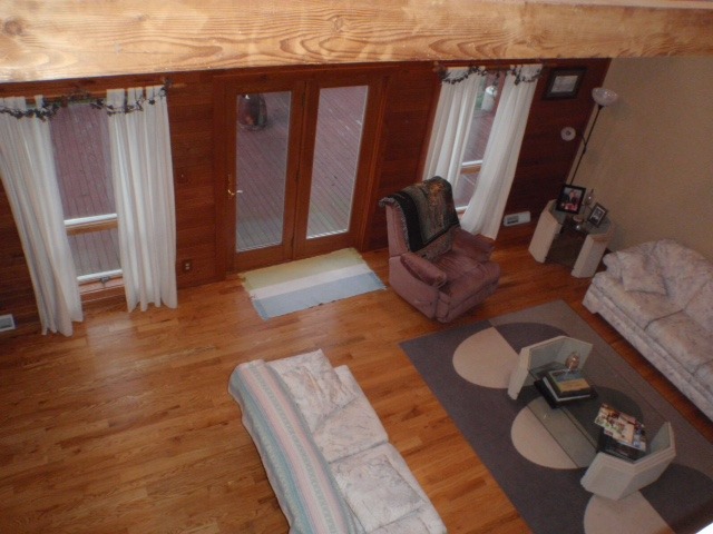 18430 East Twombly Road Rochelle, IL 61068 - Photo 5 of 25 a living room with furniture rug and wooden floor