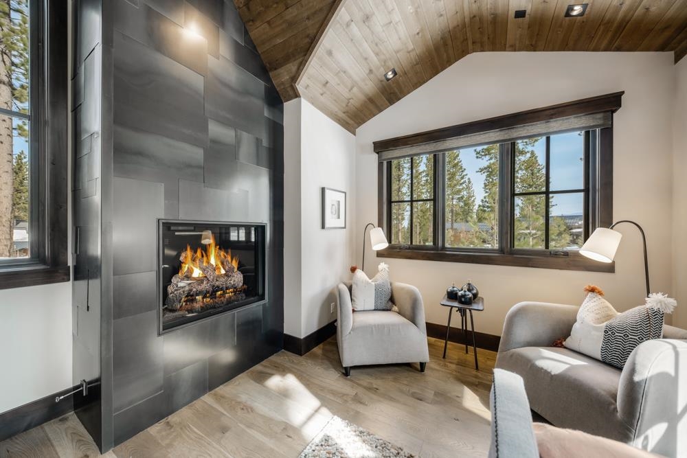 8454 Newhall Drive Truckee, CA 96161 - Photo 13 of 21 a living room with furniture and a flat screen tv