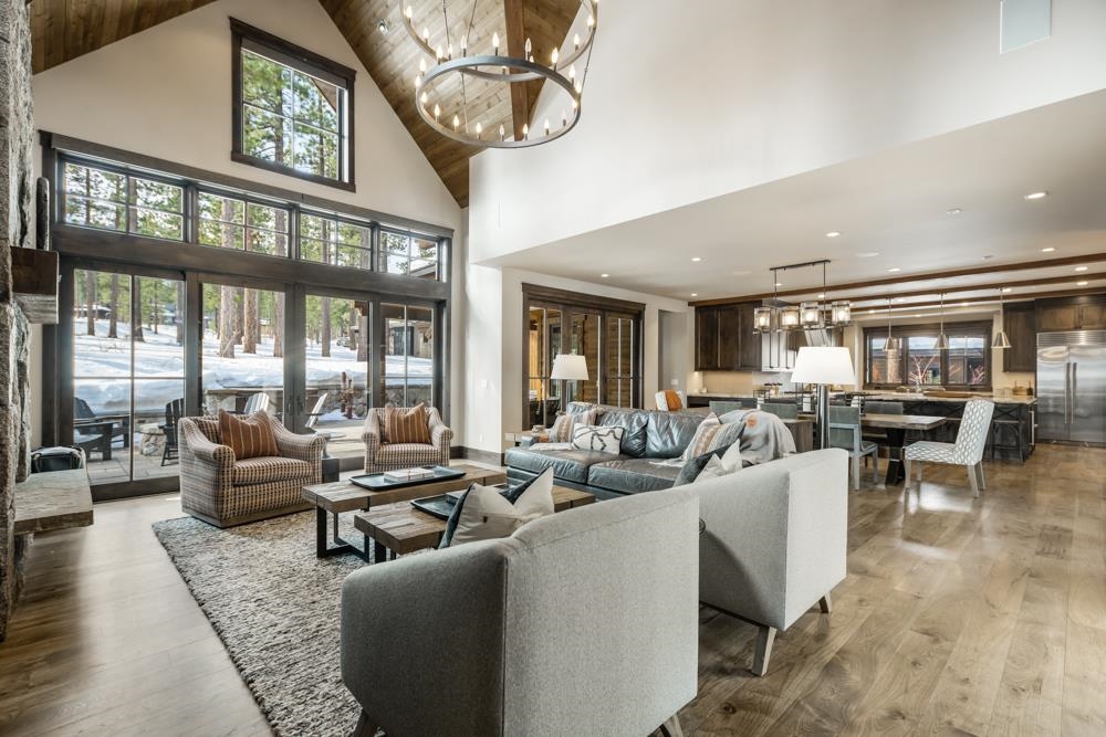 8454 Newhall Drive Truckee, CA 96161 - Photo 5 of 21 a living room with furniture wooden floor and a large window