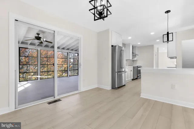 a view of empty room with windows