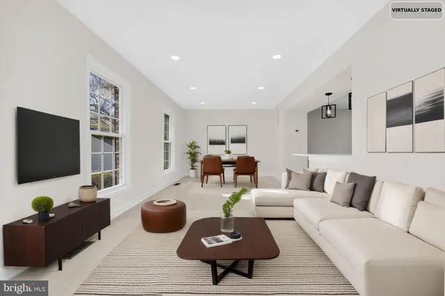 a view of an empty room with a large window