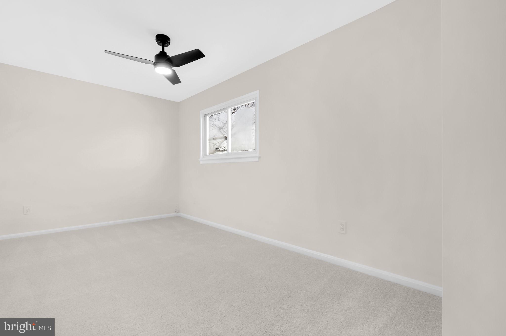 9 Joshua Tree Court Gaithersburg, MD 20878 - Photo 28 of 63 a view of empty room with ceiling fan