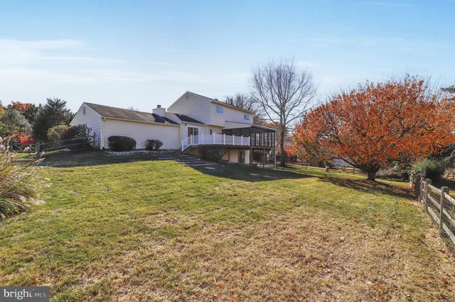 a view of porch with a large tree