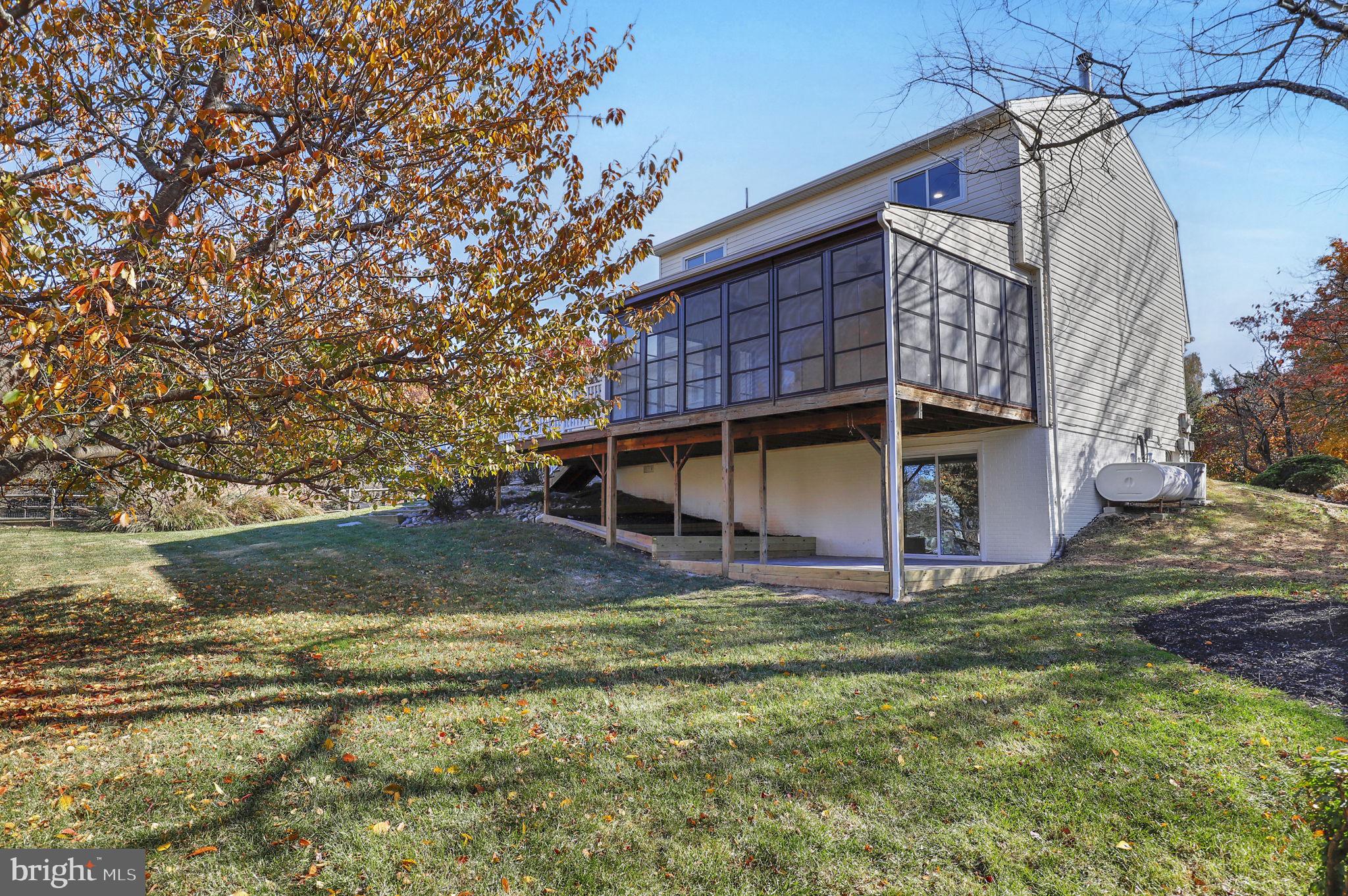 9 Joshua Tree Court Gaithersburg, MD 20878 - Photo 46 of 63 a view of a house with a yard