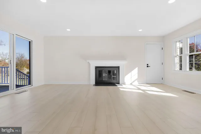 a view of entryway with wooden floor