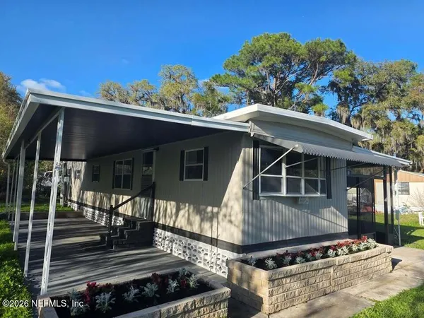 a view of house with outdoor space