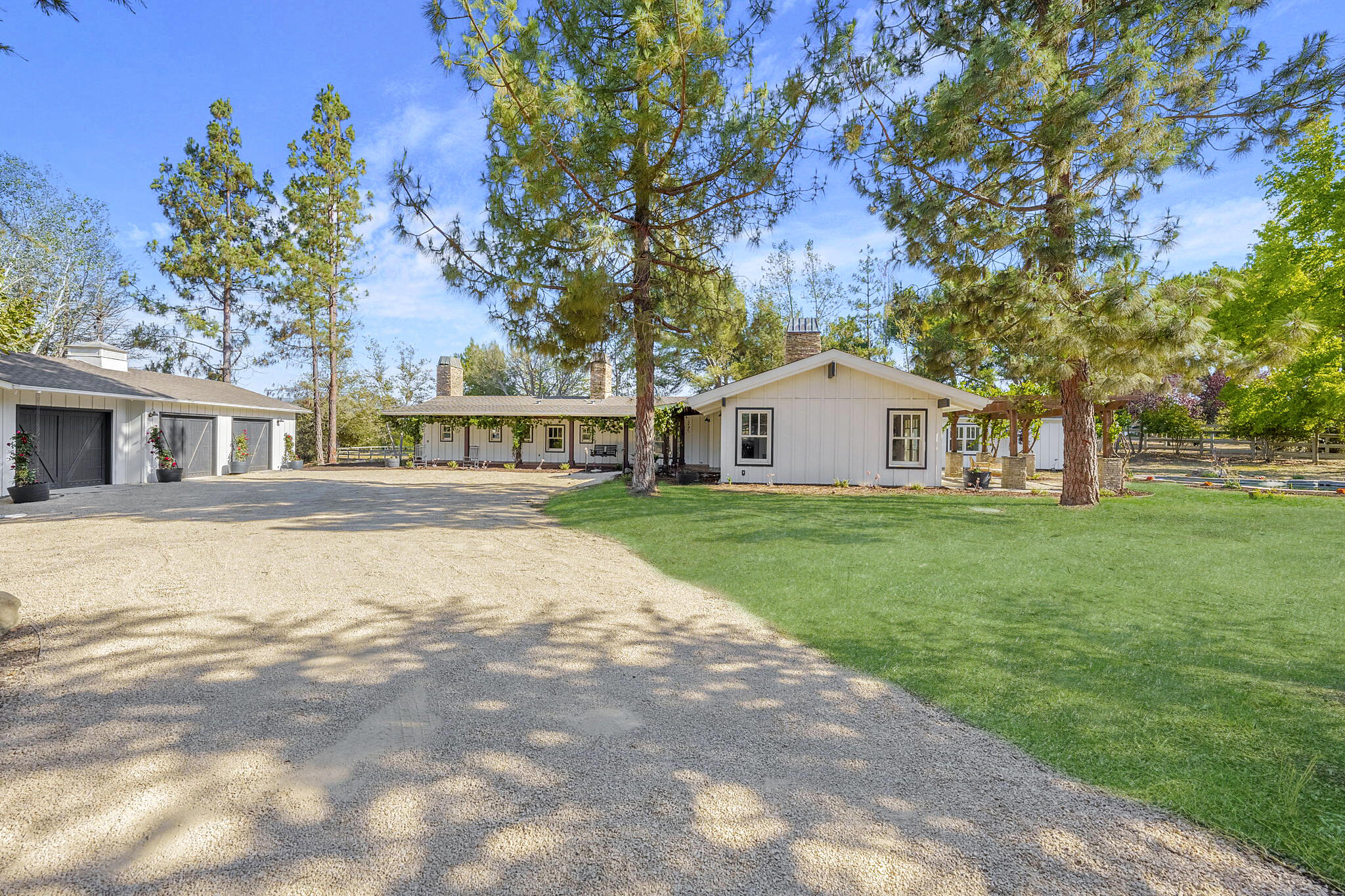a view of house with a yard