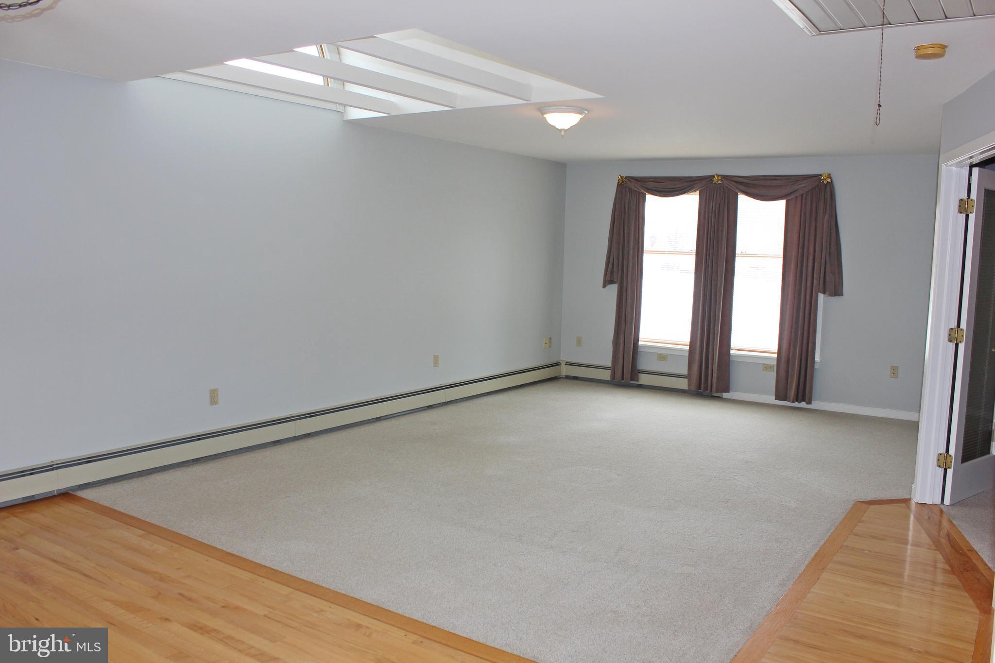 53 North Oak Street Lititz, PA 17543 - Photo 3 of 33 a view of an empty room with a window