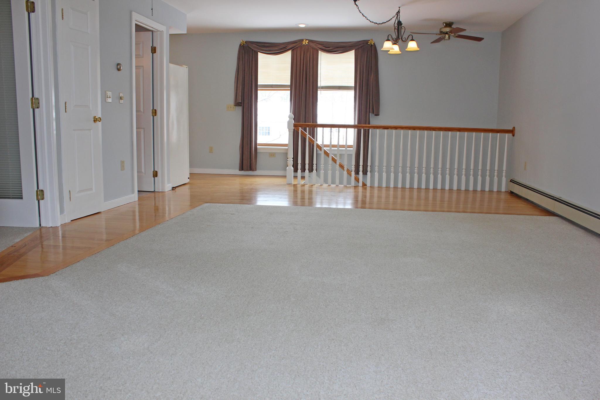 53 North Oak Street Lititz, PA 17543 - Photo 4 of 33 an empty room with windows and ceiling fan