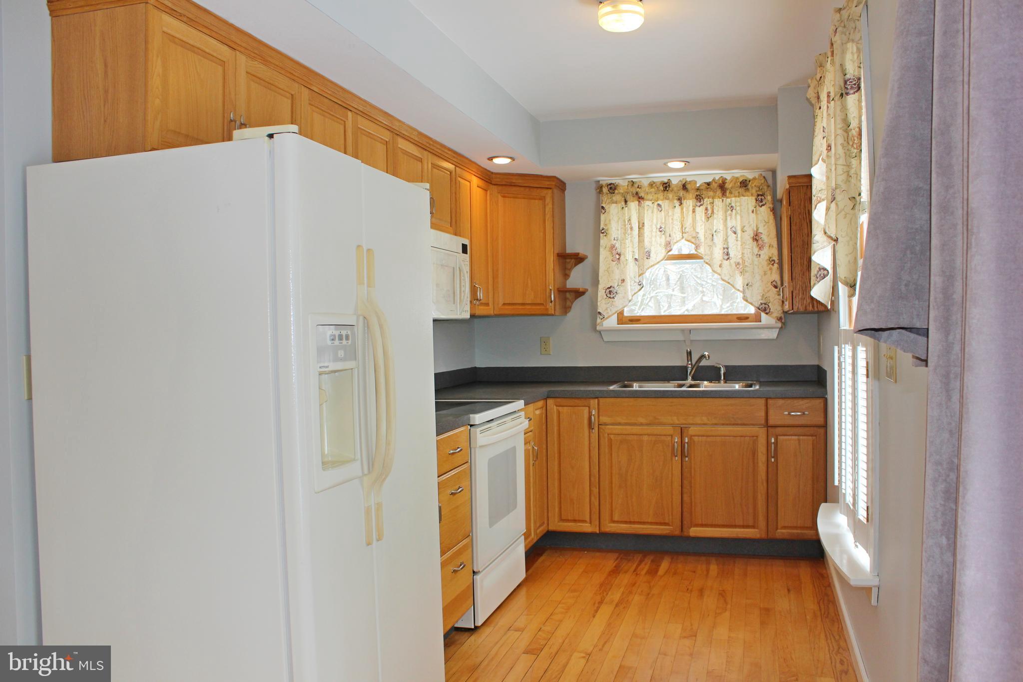 53 North Oak Street Lititz, PA 17543 - Photo 5 of 33 a kitchen with stainless steel appliances a refrigerator and a sink