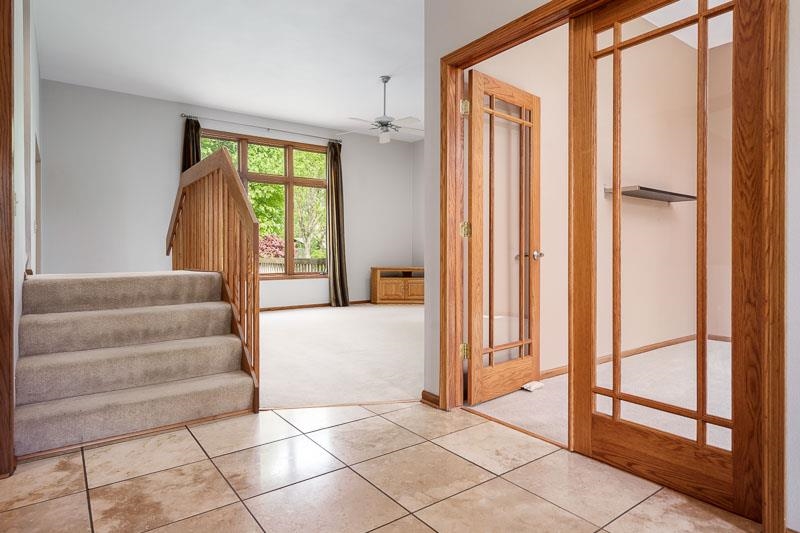 8833 West Ridge Drive Belvidere, IL 61008 - Photo 21 of 65 a view of front door with hallway and a window