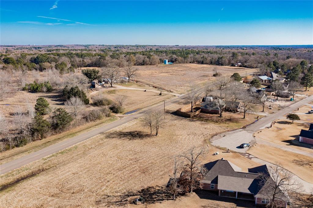 1 Fm 1799 Alba, TX 75410 - Photo 7 of 16 an aerial view of a house with a yard
