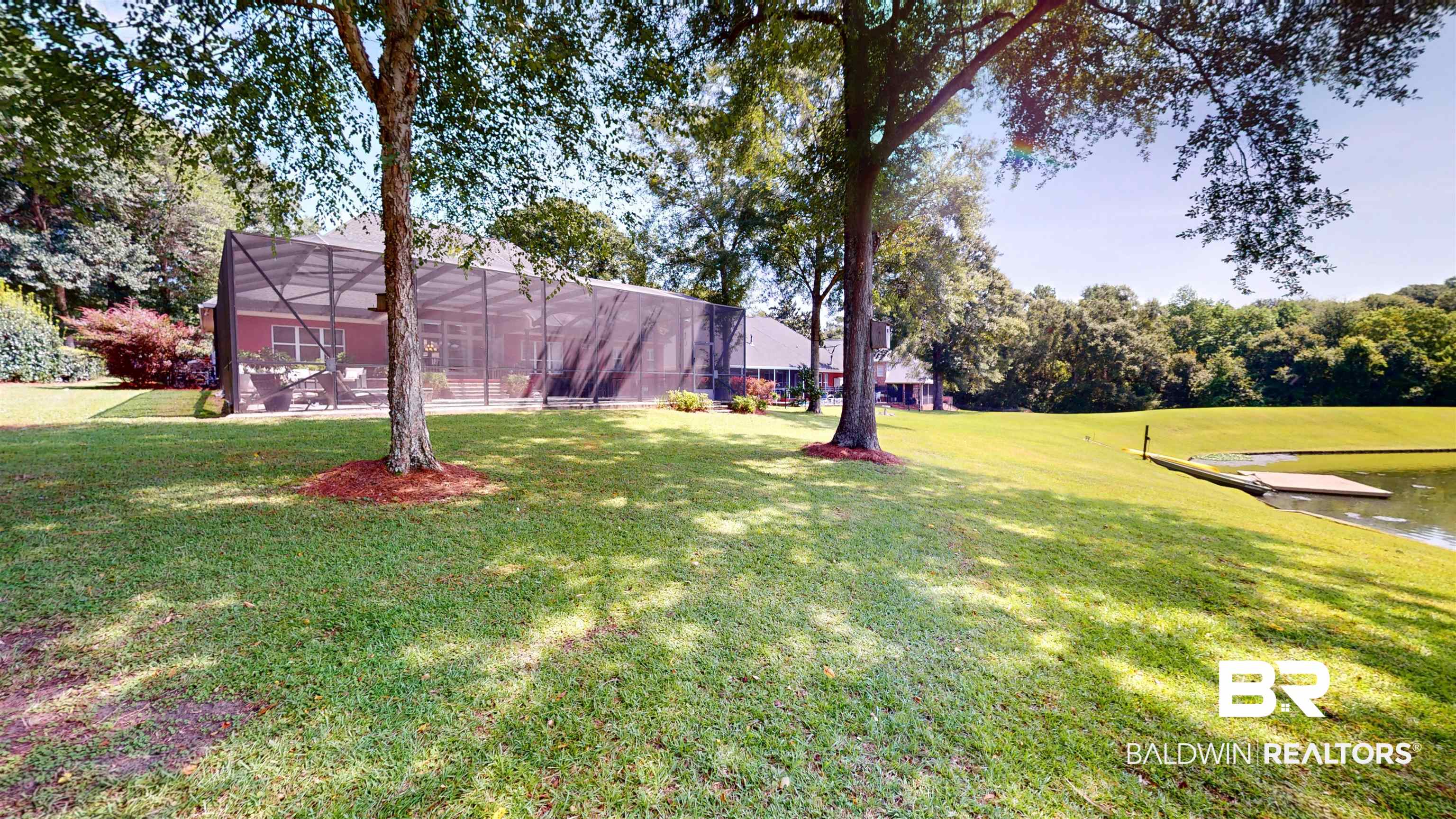 8775 Dawes Lake Road North Mobile, AL 36619 - Photo 48 of 59 View of grassy yard with a water view and a lanai
