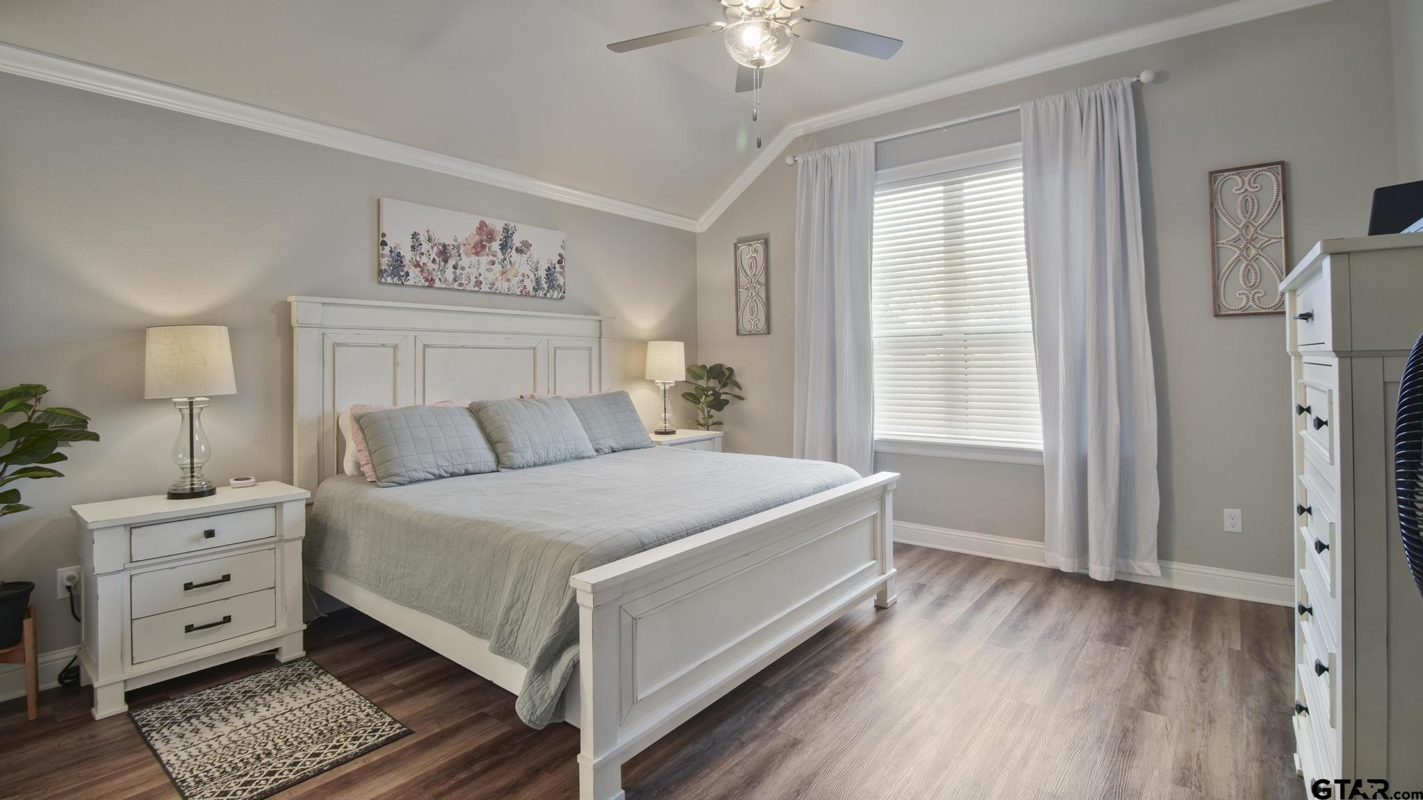 14144 Foxtail Drive Flint, TX 75762 - Photo 13 of 39 a bedroom with a large bed and a window