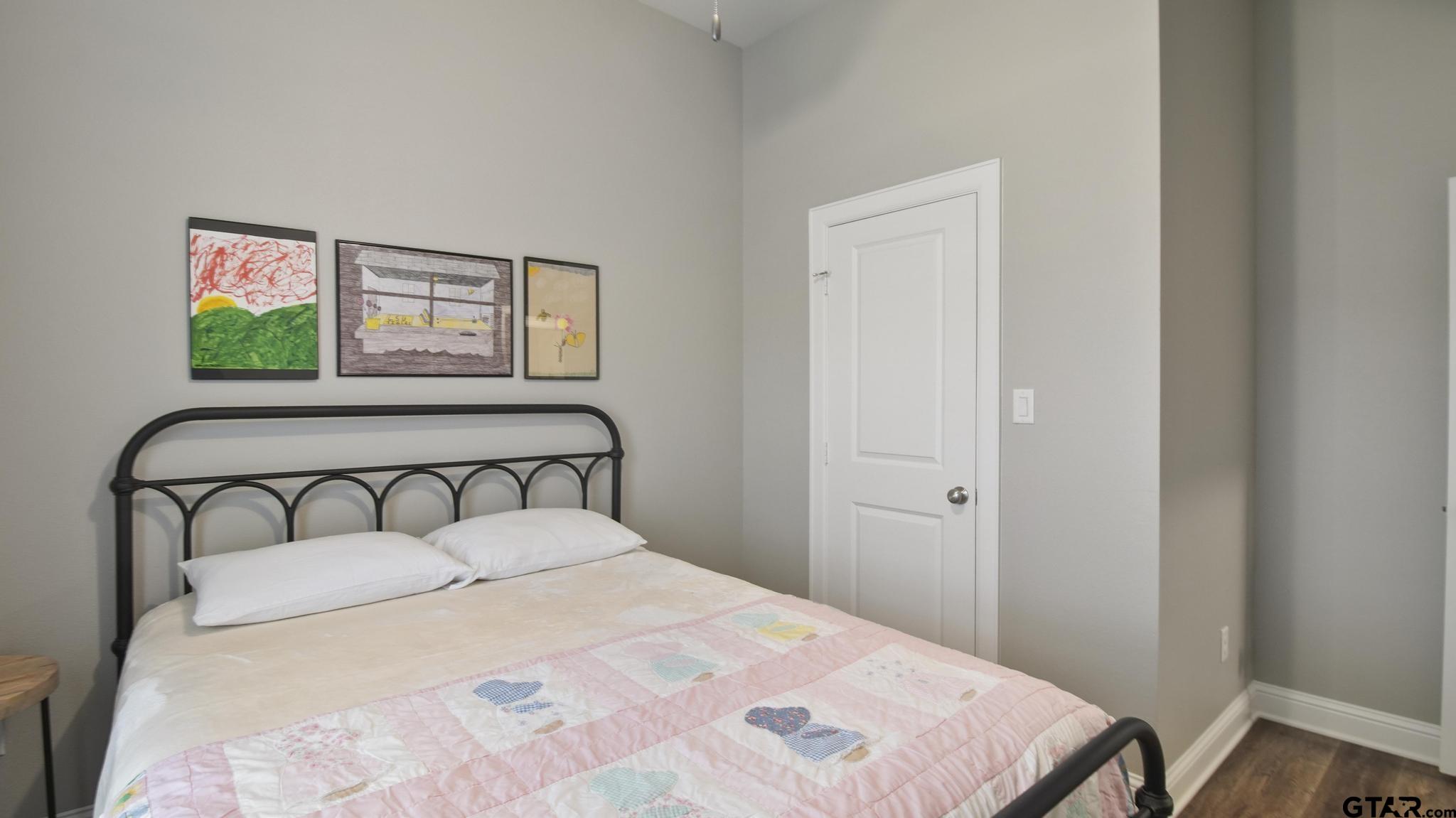 14144 Foxtail Drive Flint, TX 75762 - Photo 19 of 39 a bedroom with a bed and a window