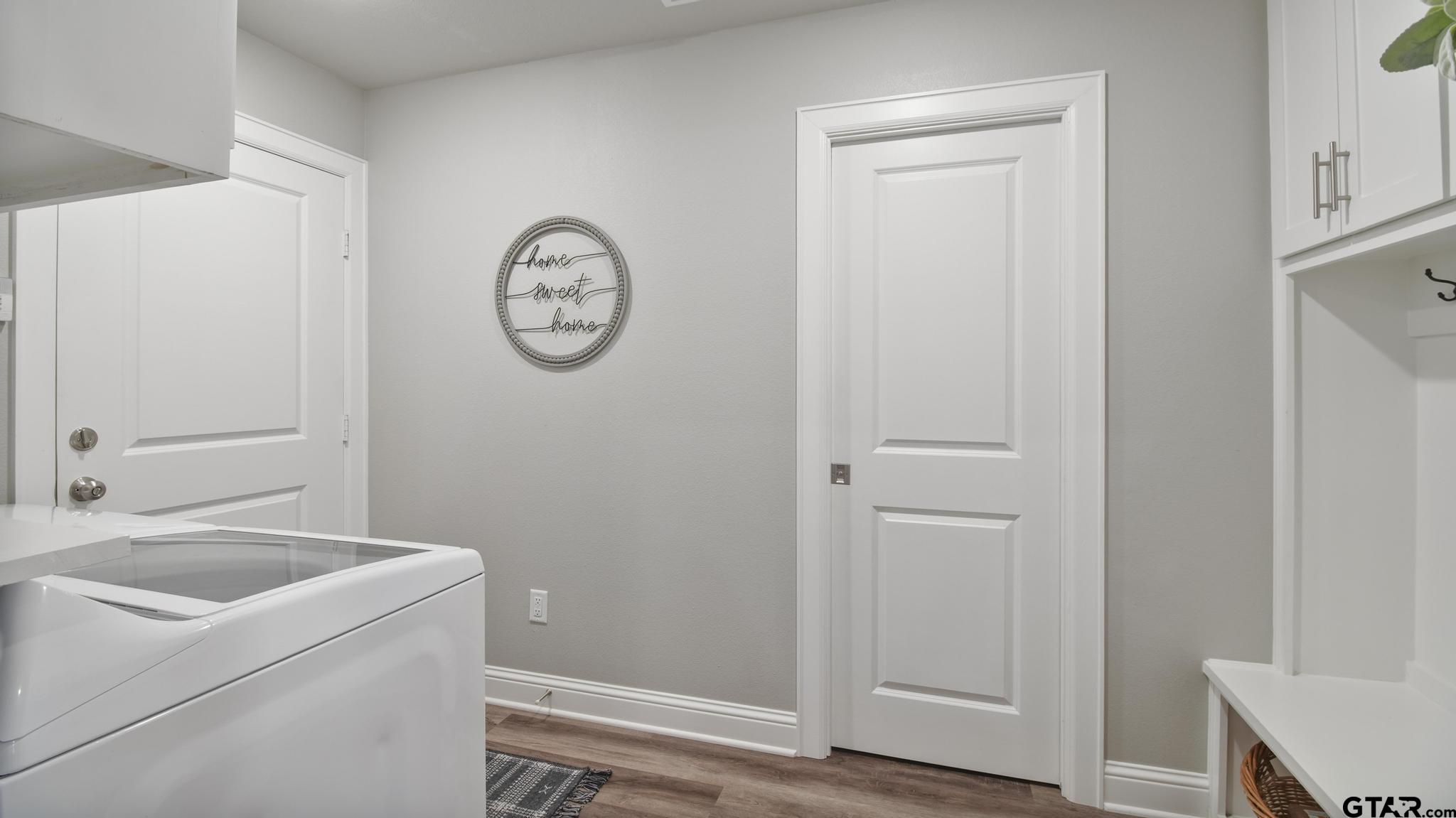 14144 Foxtail Drive Flint, TX 75762 - Photo 30 of 39 a utility room with dryer and washer