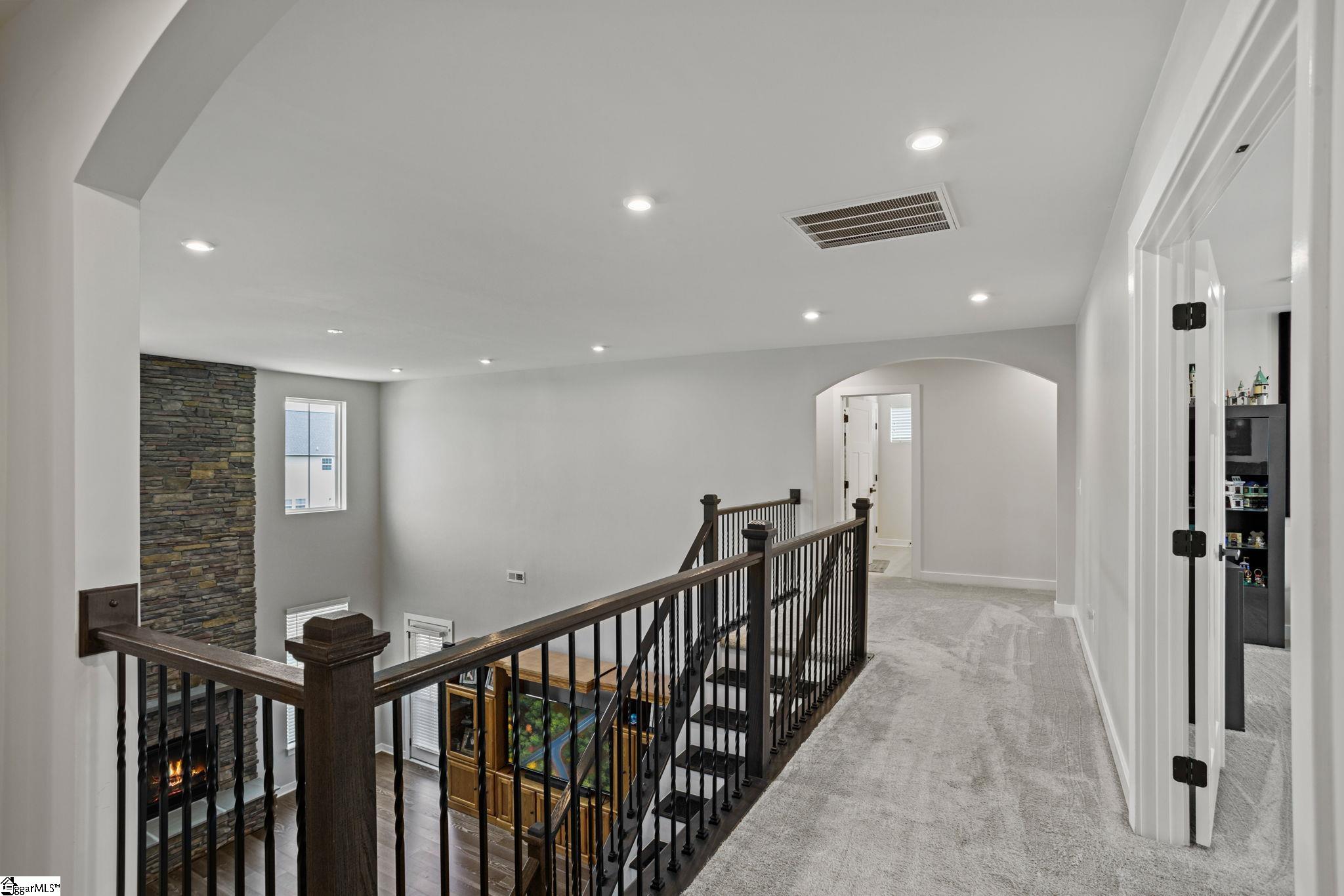 18 Blackfoot Road Greenville, SC 29607 - Photo 19 of 36 Upstairs foyer is 183 square feet and introduces 4 more bedrooms, 3.5 baths, laundry room and CINEMA THEATRE!