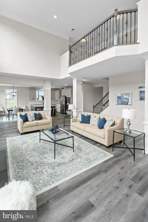 a living room with furniture and a rug