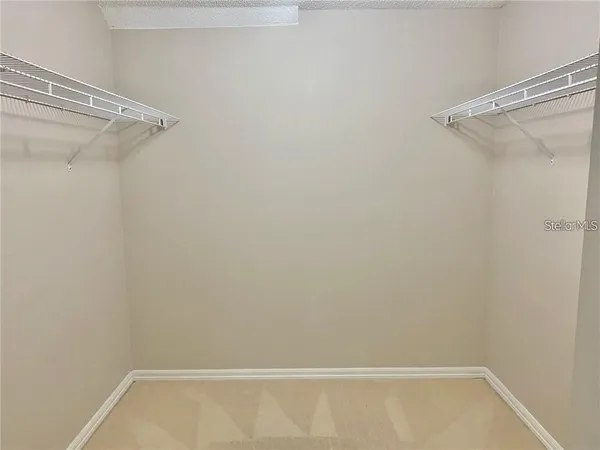 a view of small space with racks on the wall