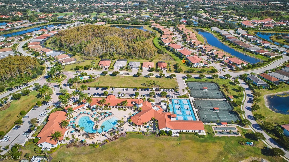 11856 Arboretum Run Drive, Unit 102 Fort Myers, FL 33913 - Photo 35 of 47 an aerial view of residential houses with outdoor space