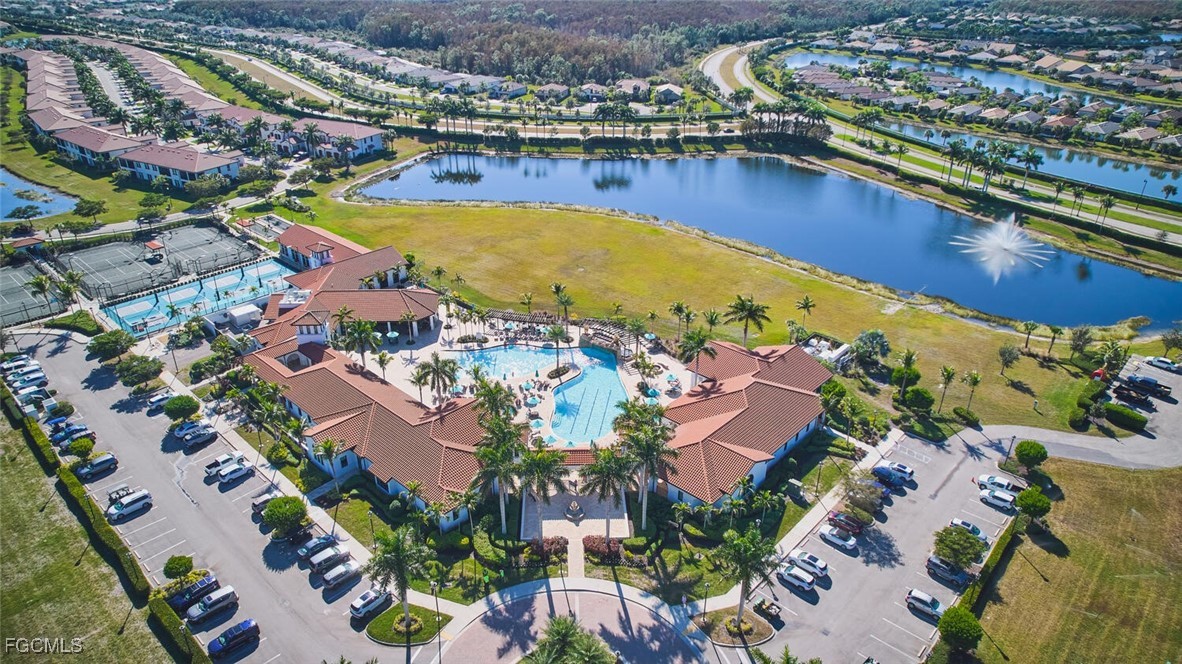 11856 Arboretum Run Drive, Unit 102 Fort Myers, FL 33913 - Photo 37 of 47 an aerial view of residential houses with outdoor space