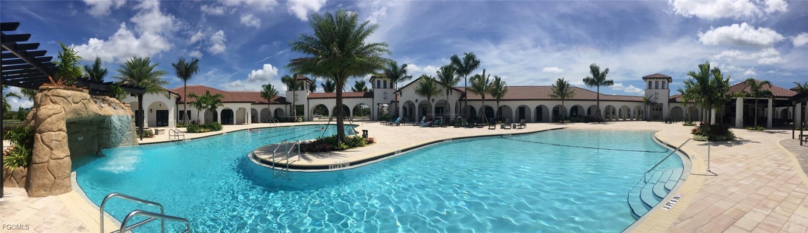 11856 Arboretum Run Drive, Unit 102 Fort Myers, FL 33913 - Photo 43 of 47 a view of a swimming pool with a patio and plants