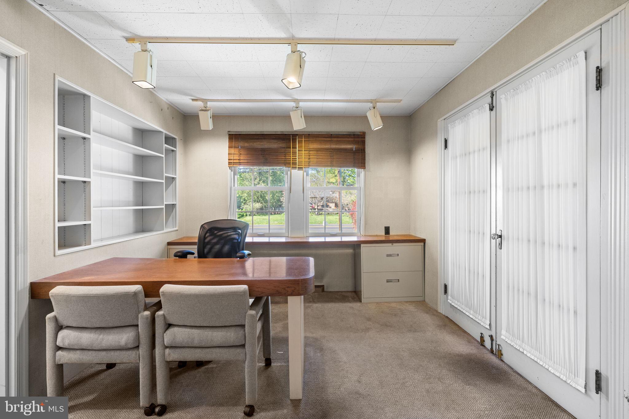 1802 Yardley Morrisville Road Yardley, PA 19067 - Photo 25 of 39 a room that has a bed and a table in it