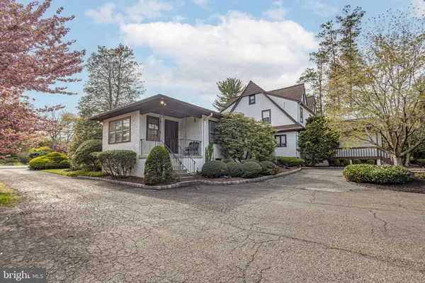 front view of a house with a small yard