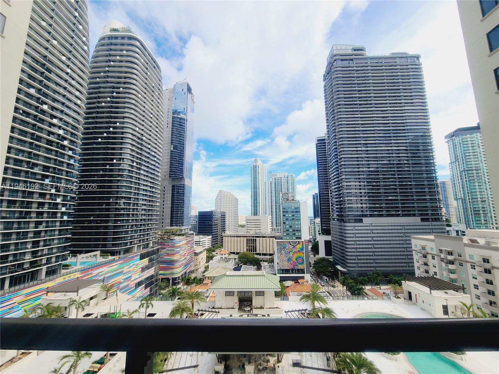 999 Southwest 1st Avenue, Unit 1808 Miami, FL 33130 - Photo 2 of 16 a view of barbeque area and building