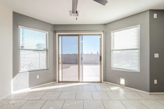 a kitchen that has a sink and a stove