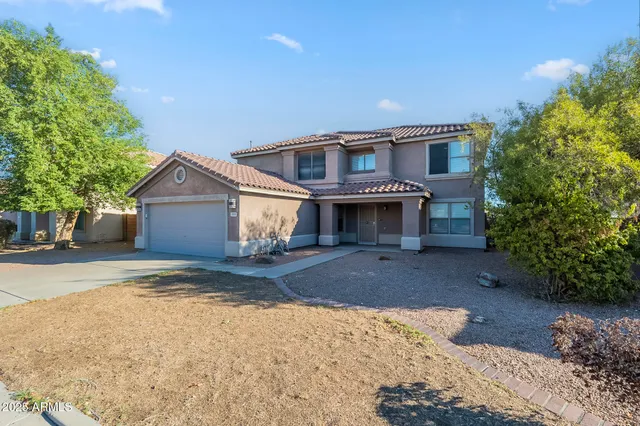 a front view of house with yard