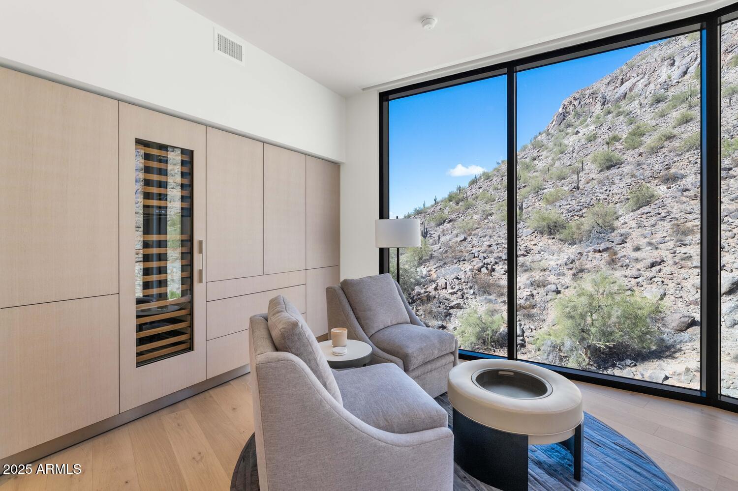 5000 East Camelback Road, Unit 407 Scottsdale, AZ 85253 - Photo 12 of 39 a living room with furniture