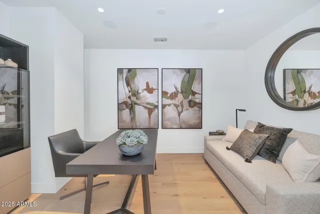 a living room with furniture and a table