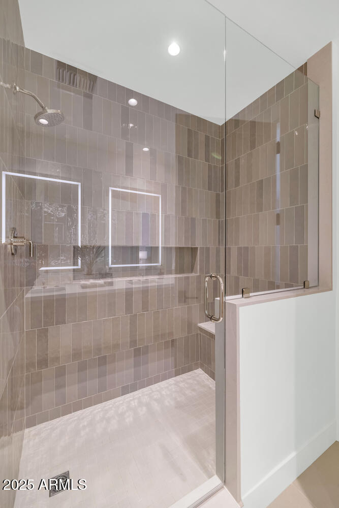 5000 East Camelback Road, Unit 407 Scottsdale, AZ 85253 - Photo 22 of 39 a bathroom with a shower