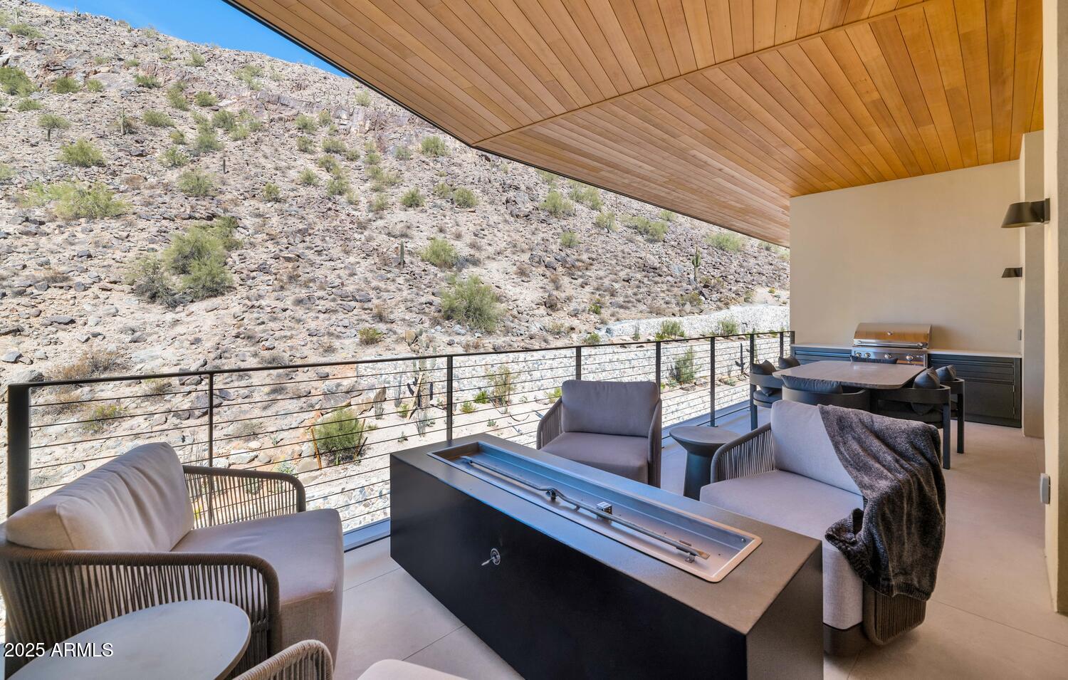 5000 East Camelback Road, Unit 407 Scottsdale, AZ 85253 - Photo 24 of 39 a view of a balcony with chairs