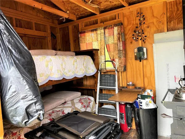 a view of a garden with a building in the background