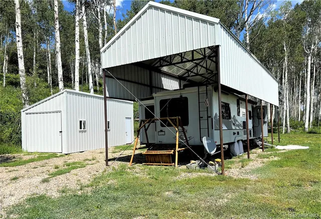 a kitchen with a refrigerator sink and stove