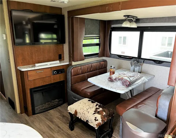 a view of kitchen island with furniture and window