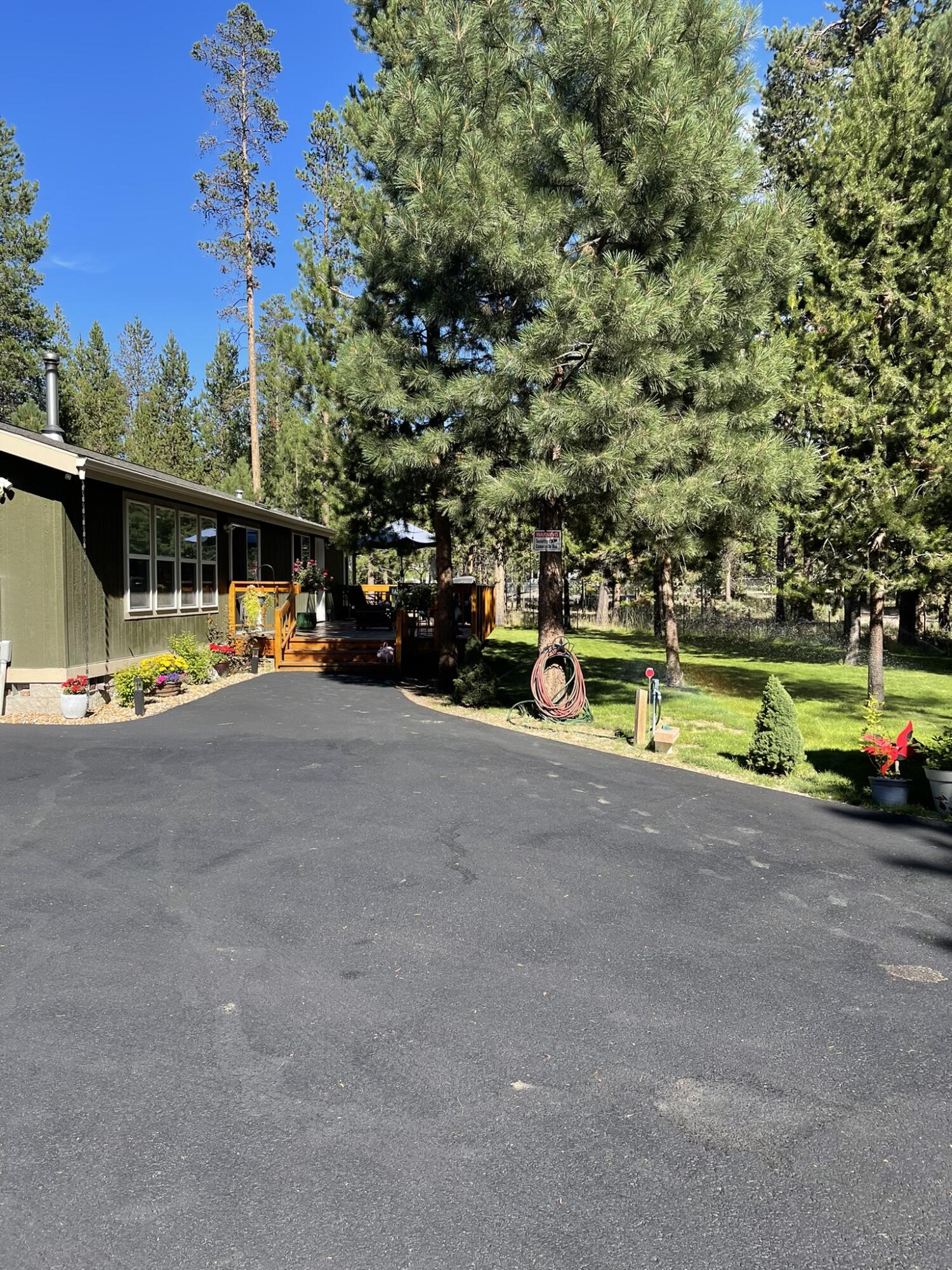 52648 Ammon Road La Pine, OR 97739 - Photo 39 of 44 a view of a park with large trees