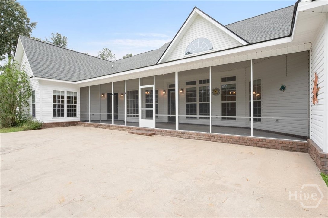 876 Old Darien Highway Riceboro, GA 31323 - Photo 28 of 38 Screened back porch and large patio