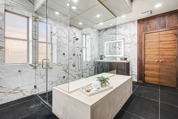 a living room with hard wood flooring and furniture