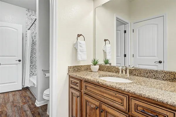 a view of a livingroom with a furniture and a stove top oven